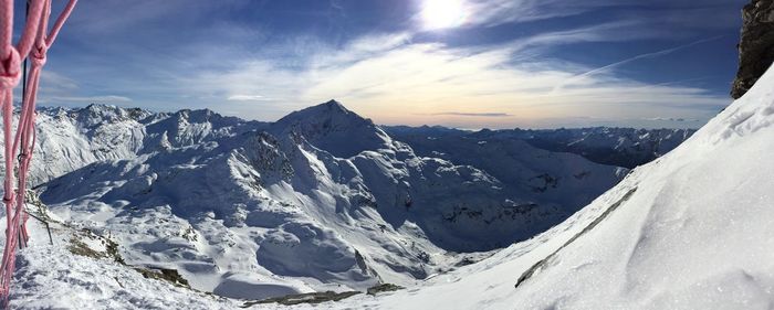 Scenic view of snowcapped mountains against sky