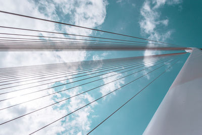 Low angle view of cables against sky