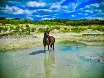 Man riding horse