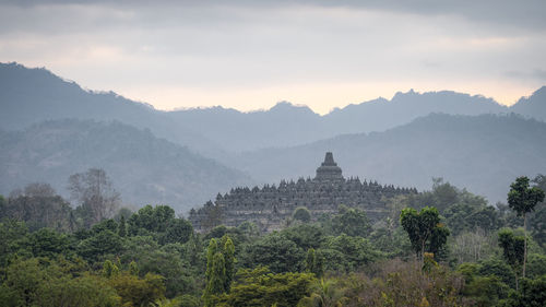 View of temple against mountain range