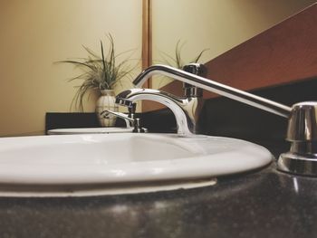 Close-up of faucets on sink
