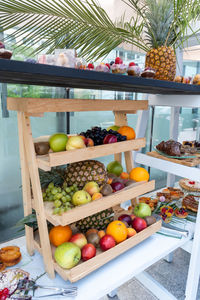 Fruits and vegetables on display at market stall