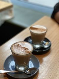 Close-up of coffee cup on table