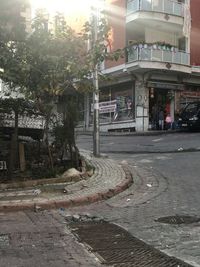 Street by building in city