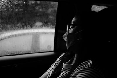 Sleeping on the road in black and white