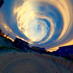 Built structure against cloudy sky