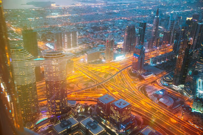 High angle view of illuminated buildings in city