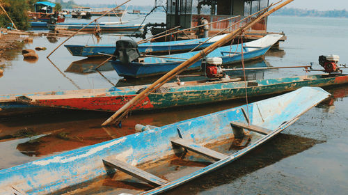 Boats moored in sea