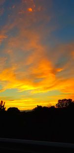 Scenic view of dramatic sky during sunset