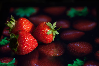 Close-up of strawberries on digital tablet