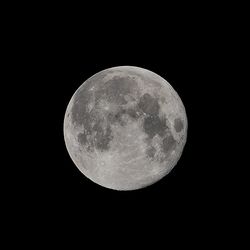 Low angle view of moon in sky