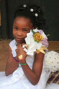 Portrait of a girl holding flower bouquet