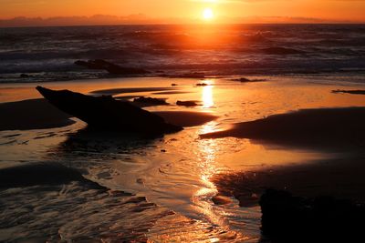 Scenic view of sea against sky during sunset