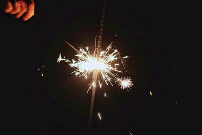 Firework display at night