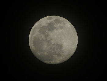 Low angle view of moon against sky at night