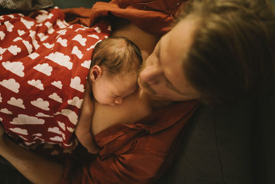 Father with newborn baby