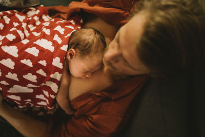Rear view of mother and son