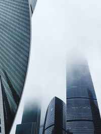 Low angle view of modern buildings against sky