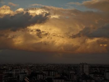 High angle view of townscape against sky at sunset