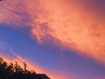 Scenic view of dramatic sky during sunset