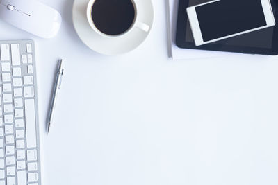 Directly above shot of coffee cup on table