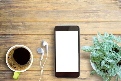 Directly above shot of coffee cup on table