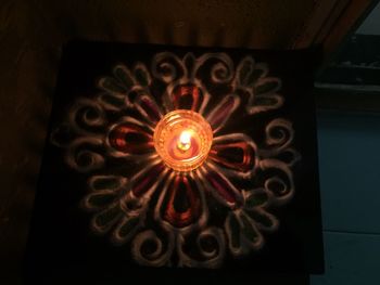 Low angle view of illuminated lighting equipment