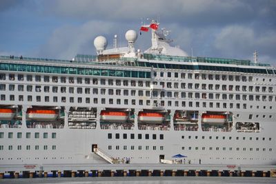 Cruise ship against sky in city