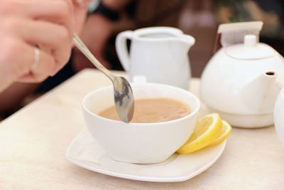 Close-up of coffee cup on table