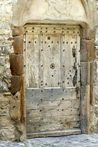 Closed wooden door of historic building