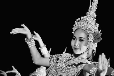 Portrait of smiling young thai woman