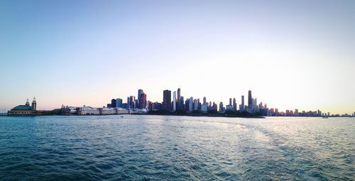 Sea with buildings in background