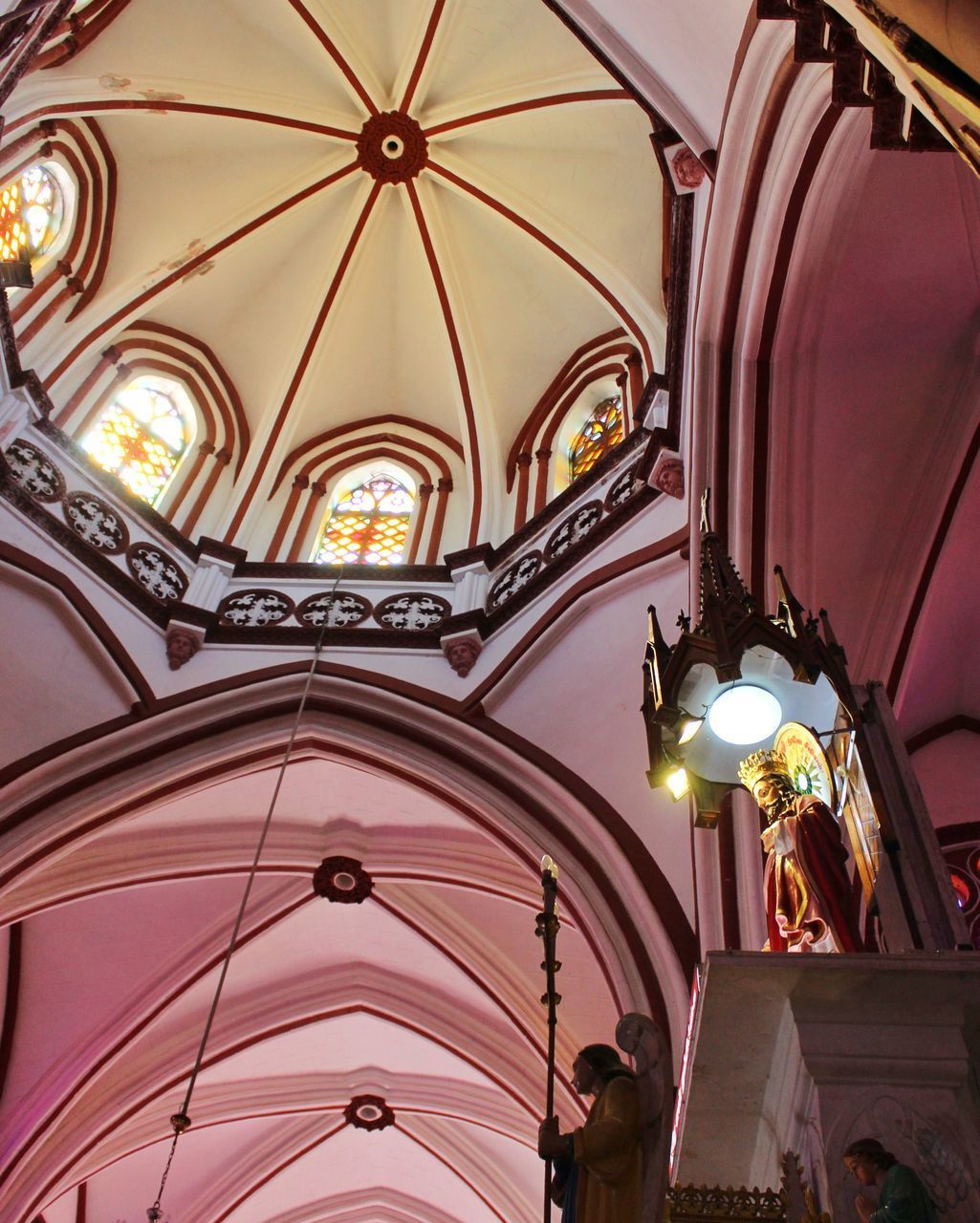 LOW ANGLE VIEW OF ILLUMINATED CHANDELIER