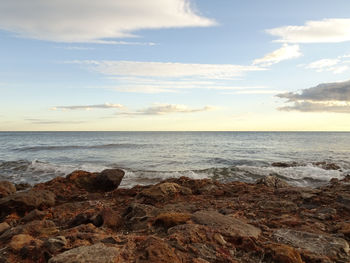 Scenic view of sea against sky during sunset