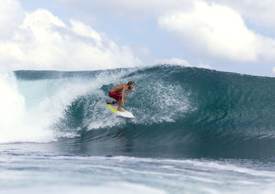 Surfer on a wave