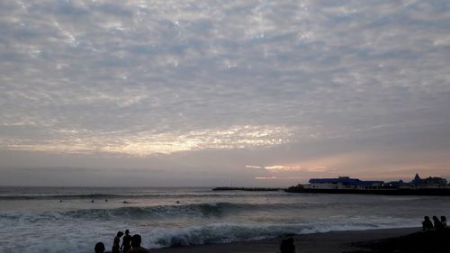 Scenic view of sea against sky at sunset