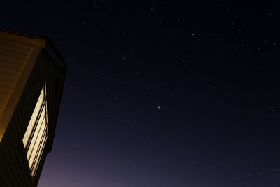 Low angle view of built structure at night