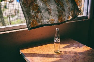 High angle view of wine glass on table