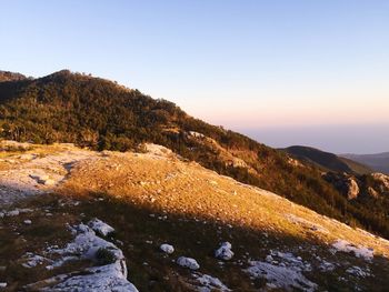 Scenic view of mountains against clear sky