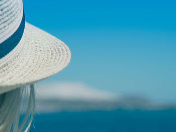 Close-up of hat against clear blue sky