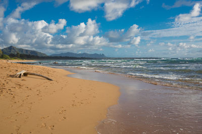 Scenic view of beach against sky