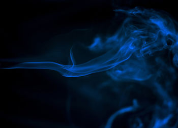 Close-up of smoke against black background