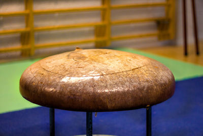 Close-up of rusty metal on table