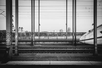 Railroad station platform seen through train window