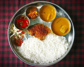Directly above shot of served food in plate