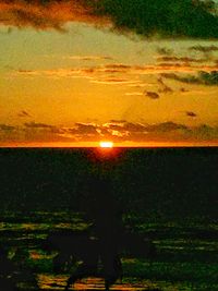 Scenic view of landscape against sky during sunset