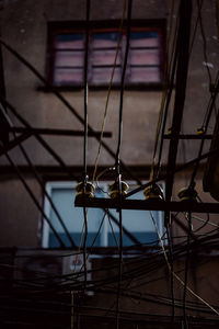 Low angle view of silhouette bicycle in building