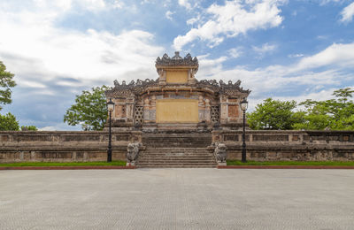 View of historical building against cloudy sky