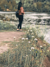 Woman standing on field