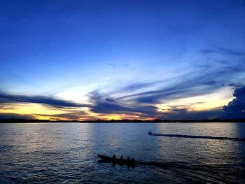 Scenic view of sea against sky at sunset